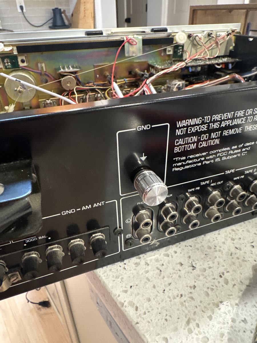 The dimmer switch mounted to the case