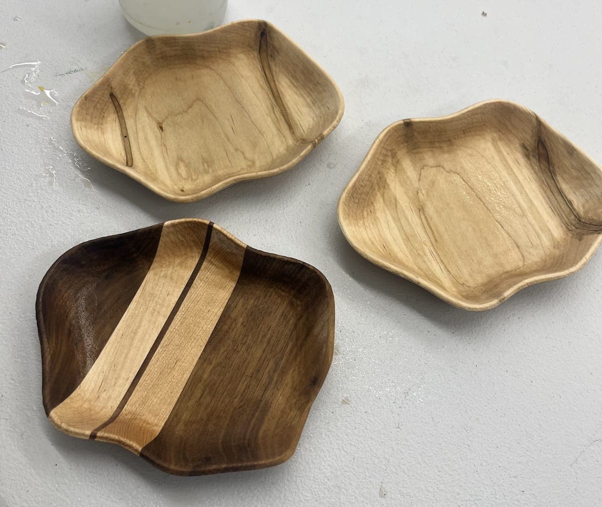Three finished watch trays